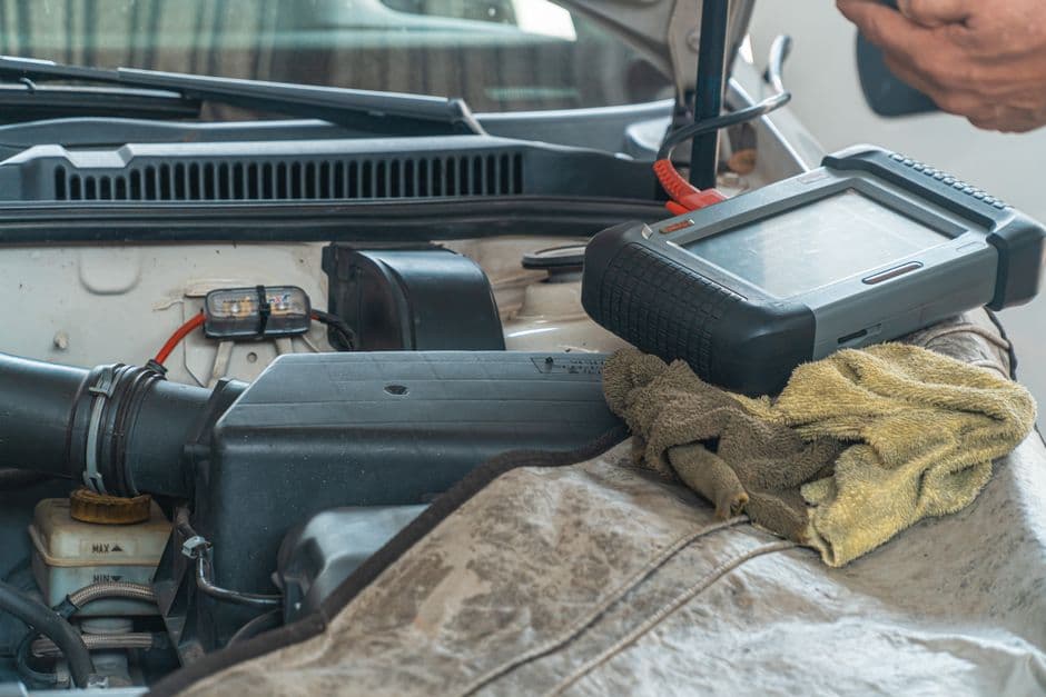 Diagnostic inspection for a humming noise while driving in a garage setting.