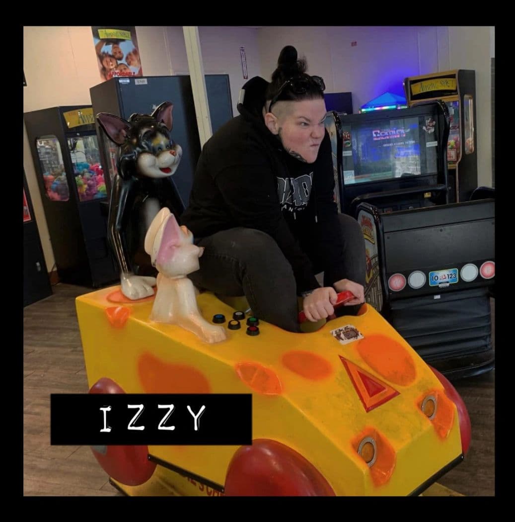 Izzy, a tattoo artist at Capital Tattoo Company